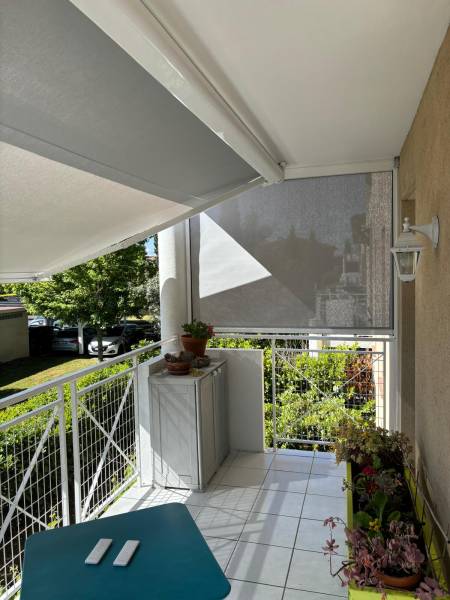 installation d'un store banne pose en plafond sur Toulouse